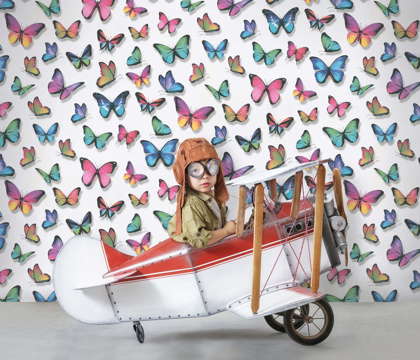 Wallpaper for nursery with multicolored butterflies