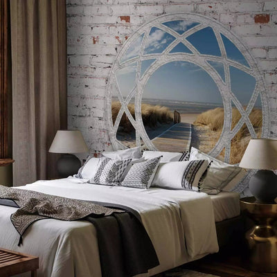 Wall Murals - view from the window between white bricks on a sandy beach G-ART