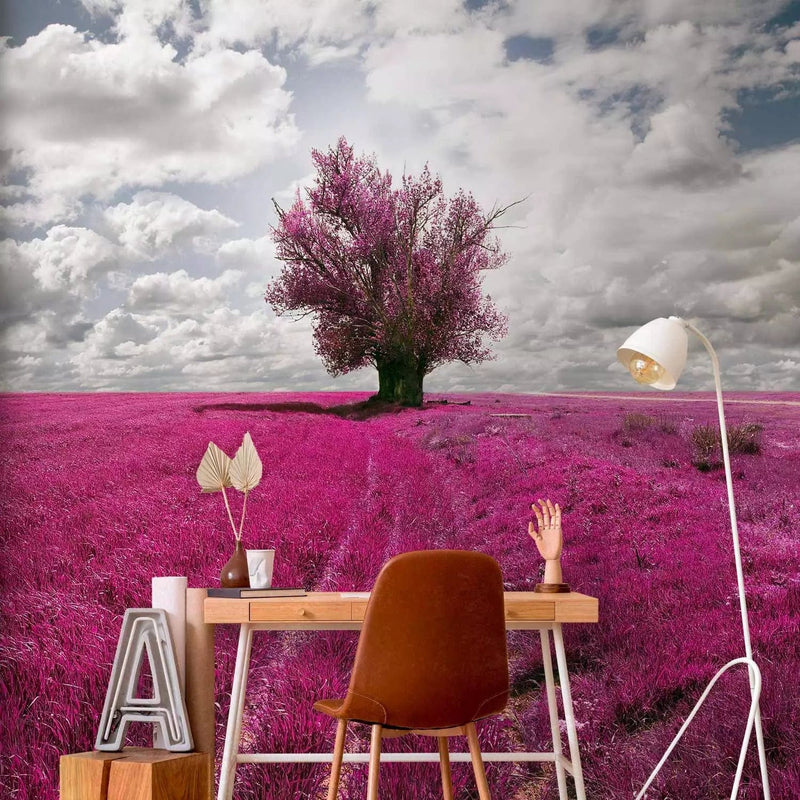 Wall Murals with a lonely pink tree in a meadow landscape - chooseG-ART